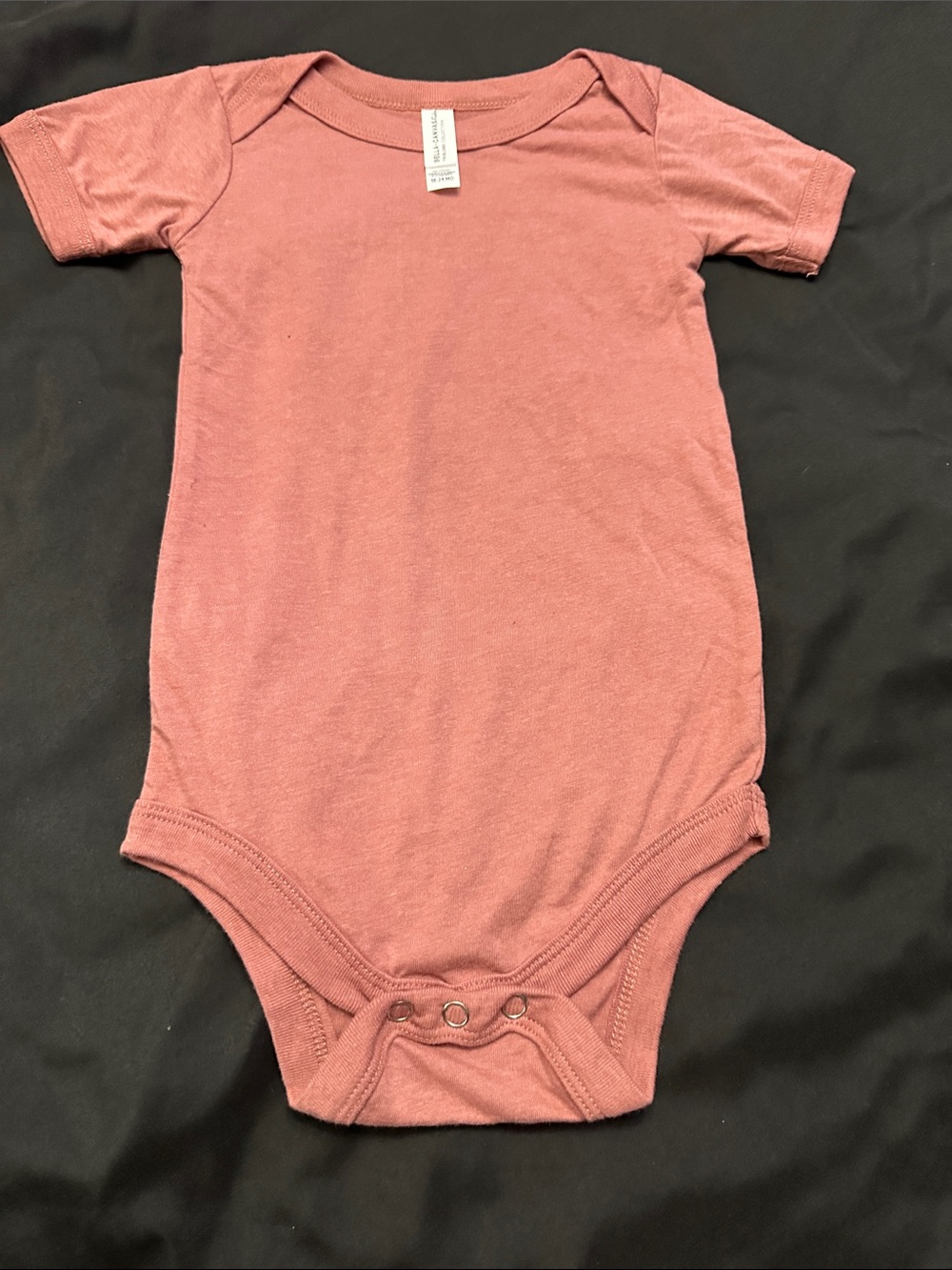 Bella Canvas Short-Sleeve One-Piece Bodysuit in Dusty Rose